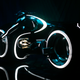 Image for article titled Tron Light Cycle Revealed Live At Flynn's Arcade!